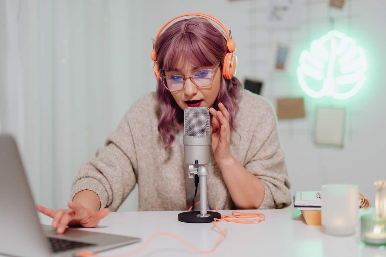 Woman talking on a microphone