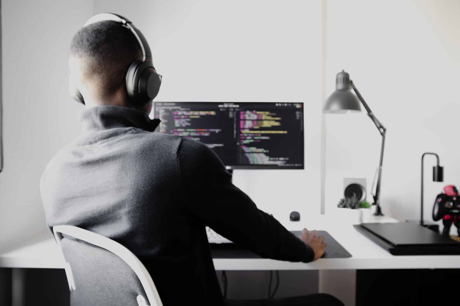 Man sitting in front of monitor