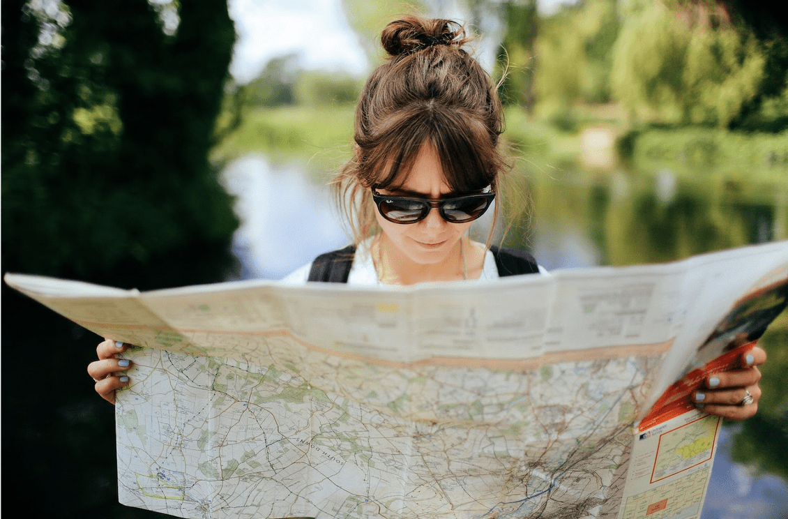 woman looking on the map